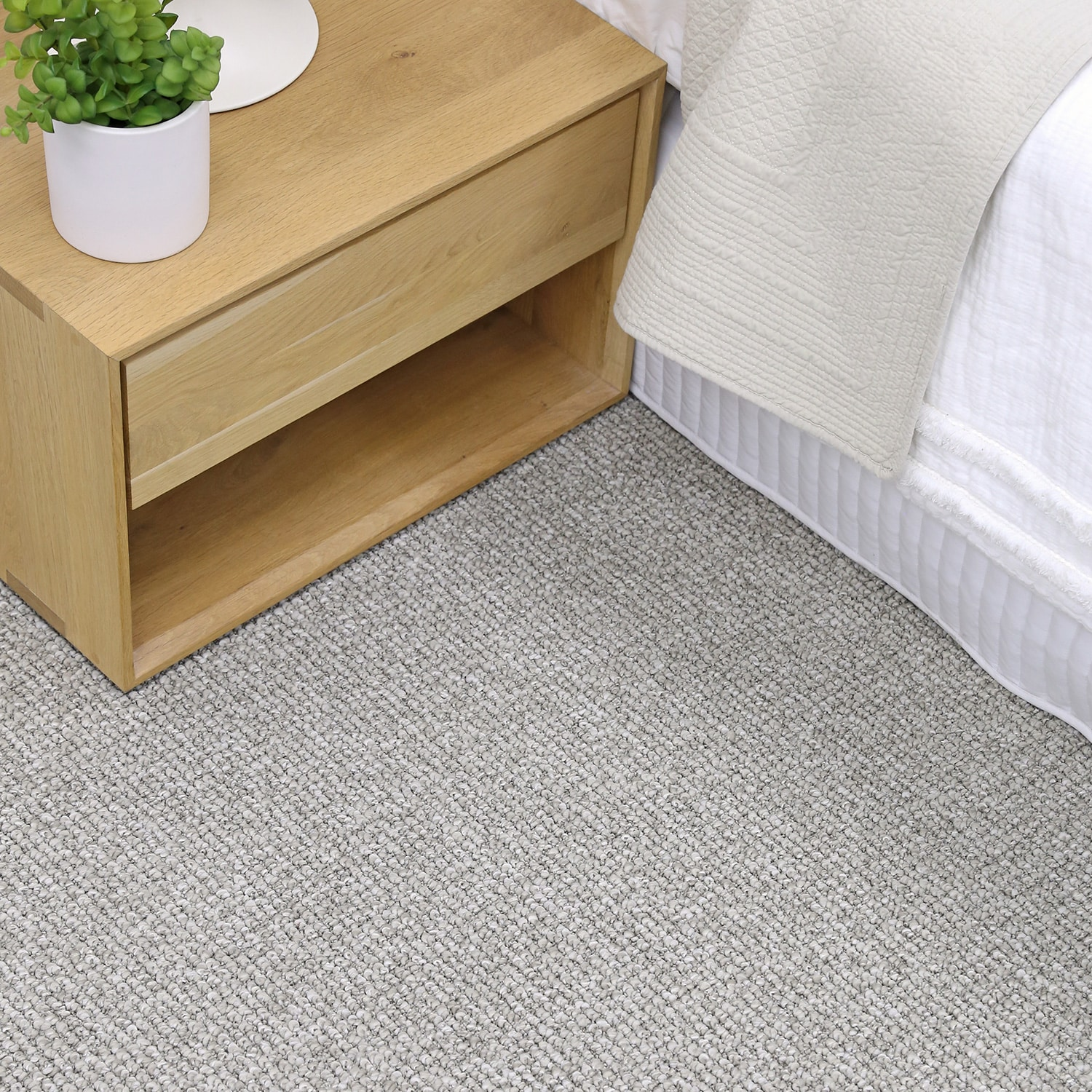 EC Carpets Woodchester carpet beside a bed