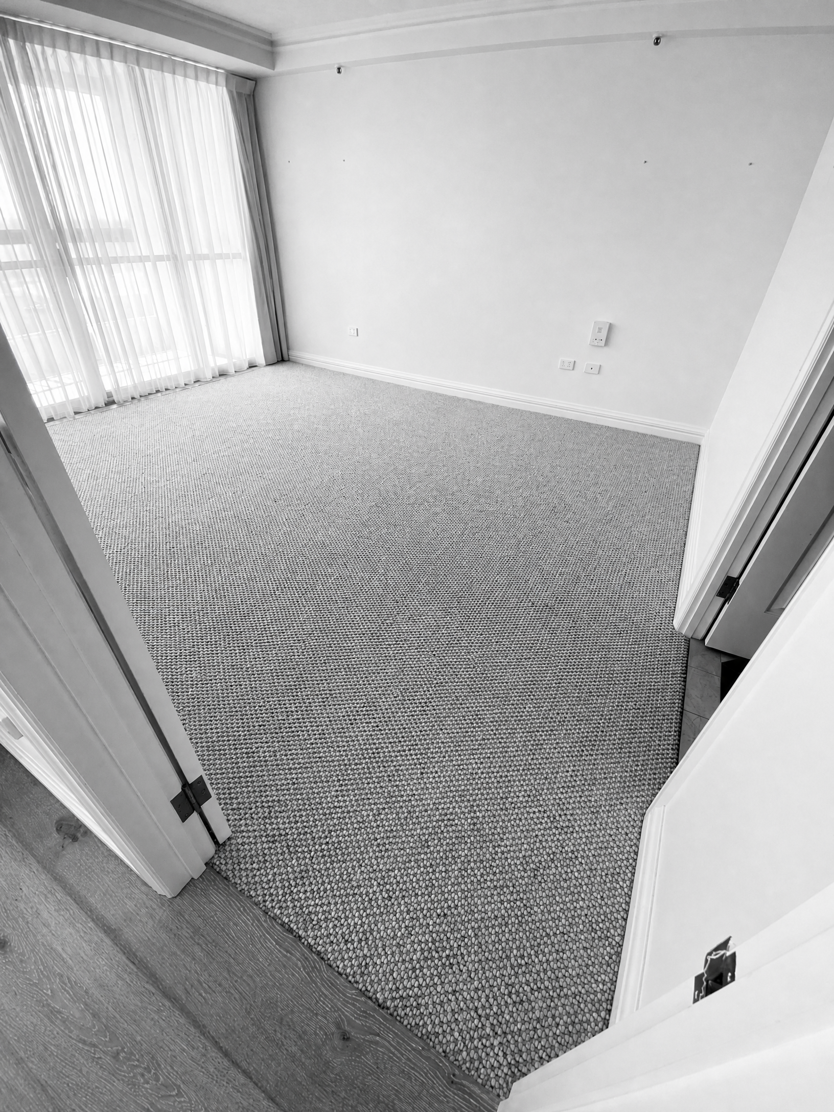Textured loop pile carpet installed by Bell Carpets